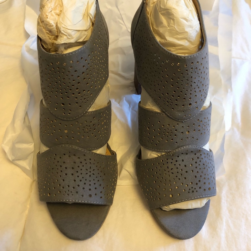 Laser cut peep toe bootie